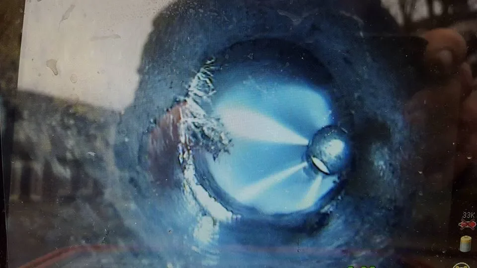 Jetting drain to clear roots