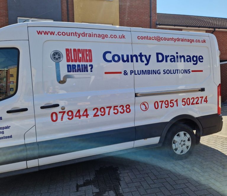Van for County Drainage & Plumbing Solutions with contact numbers and website details.